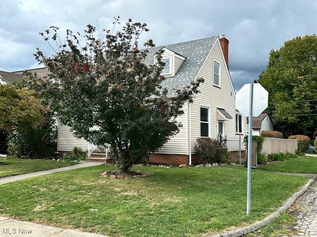 exterior space featuring a front lawn