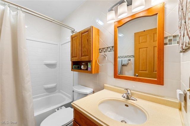 full bathroom with backsplash, vanity, shower / bathtub combination with curtain, tile walls, and toilet