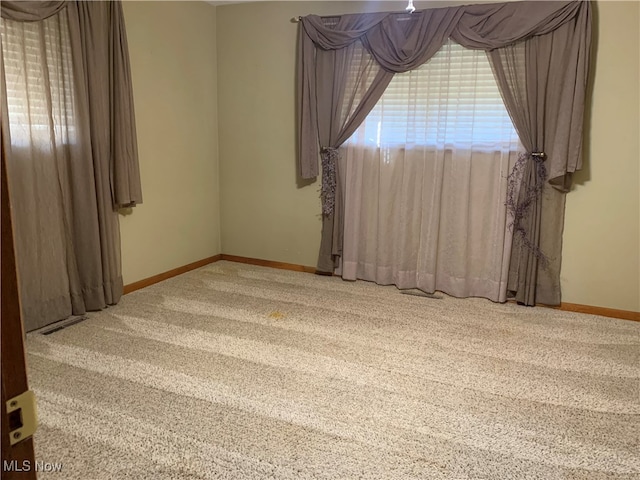 view of carpeted spare room