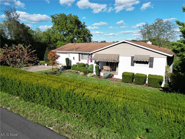 view of front of home with a front yard