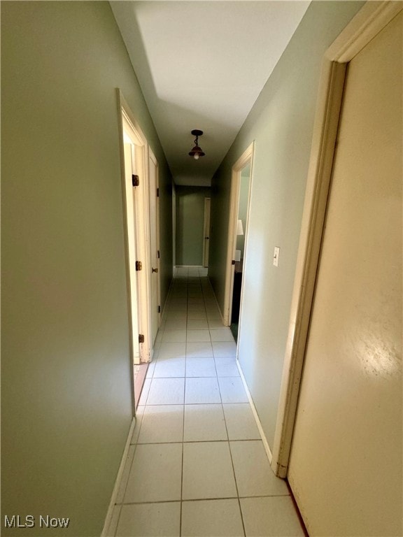 hallway with light tile patterned flooring