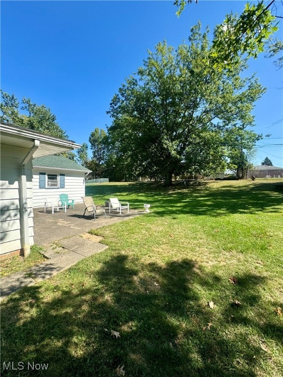 view of yard with a patio area