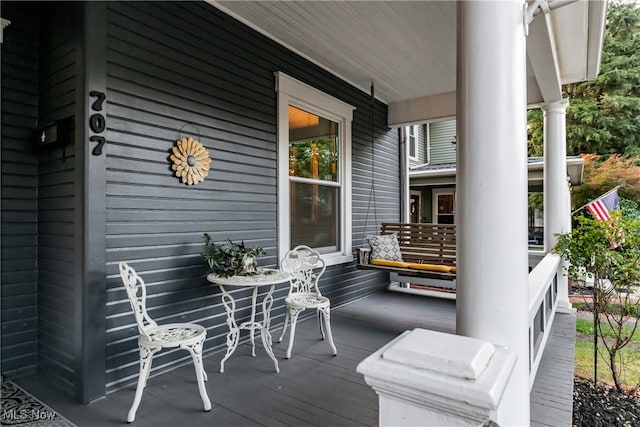 wooden deck with a porch