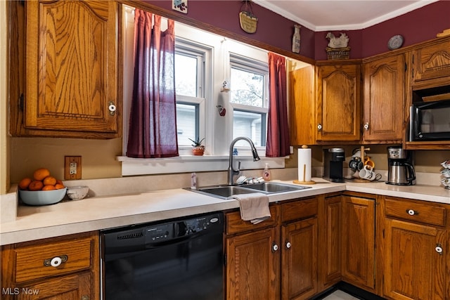 kitchen with crown molding, black appliances, and sink