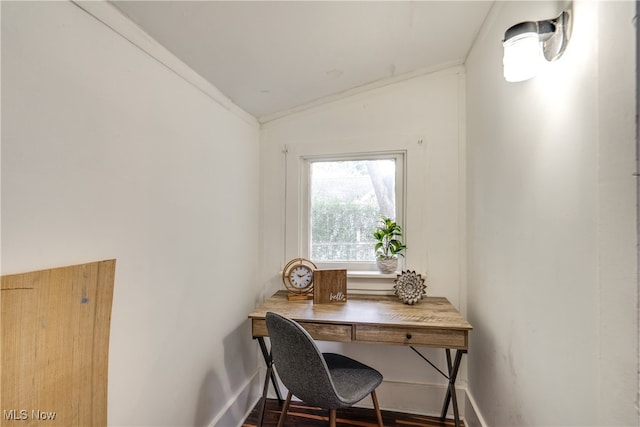 office space featuring crown molding, lofted ceiling, and hardwood / wood-style flooring