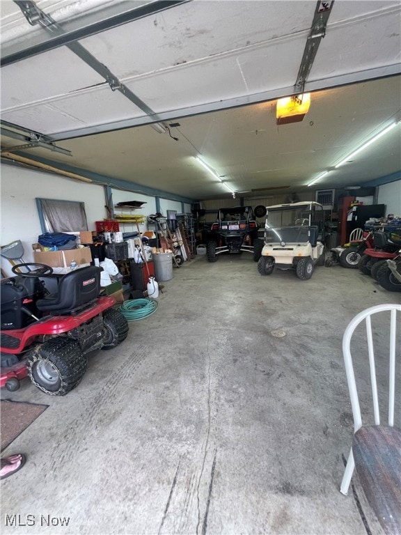 garage featuring a garage door opener