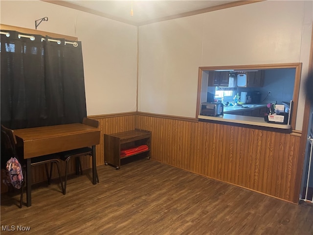 miscellaneous room featuring hardwood / wood-style floors, ornamental molding, and sink