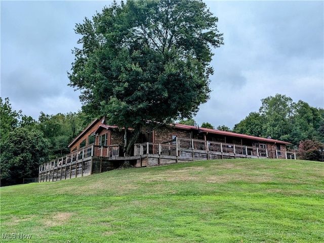 exterior space with a front lawn