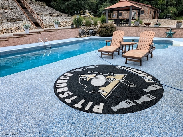 view of pool with a gazebo