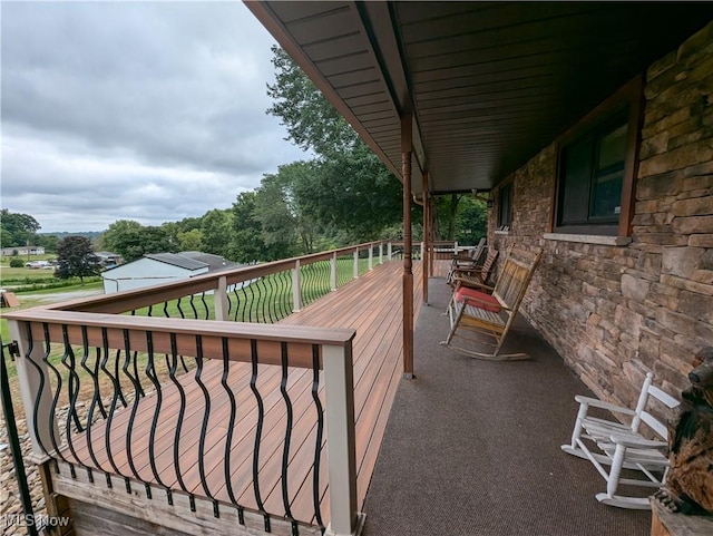 view of wooden balcony featuring a deck