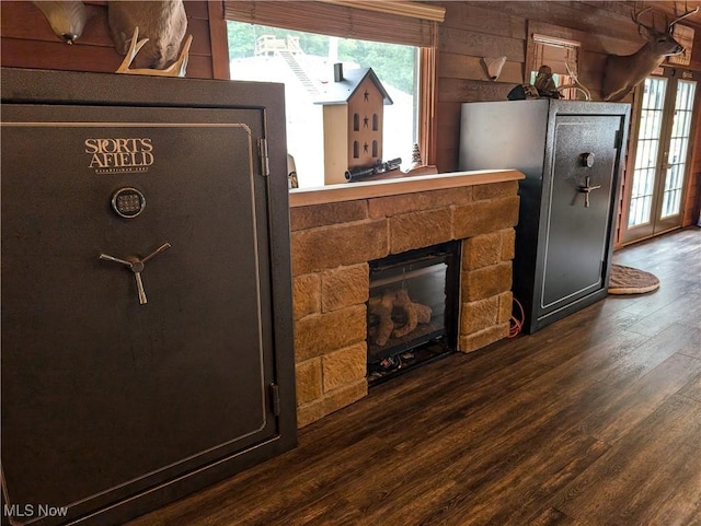 living room featuring a fireplace and wood finished floors