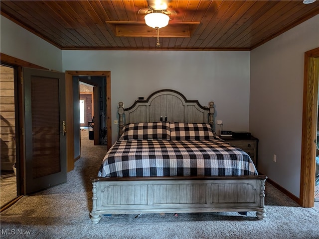 carpeted bedroom with ceiling fan, wooden ceiling, and crown molding