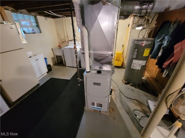 utility room with water heater