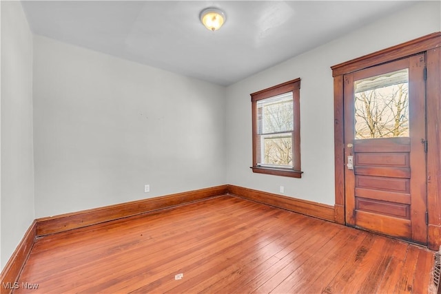 entryway with hardwood / wood-style flooring and a wealth of natural light