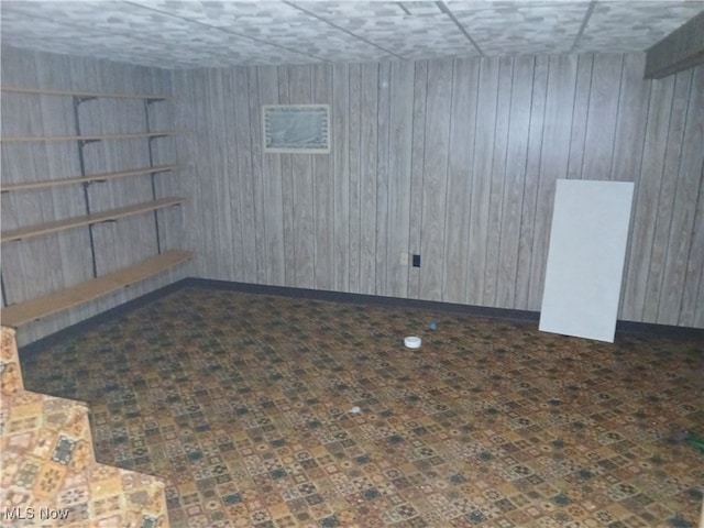 basement with wood walls