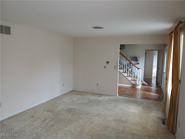 empty room with wood-type flooring