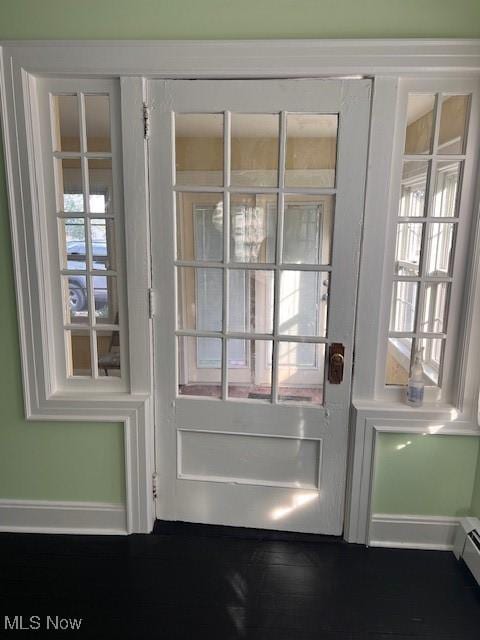 837 Quincy St, Parkersburg, WV 26101 - entryway with baseboards and a baseboard heating unit