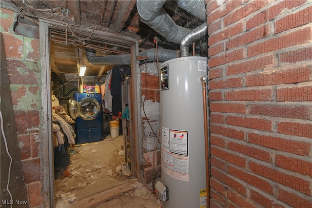 utility room featuring washer / clothes dryer and gas water heater