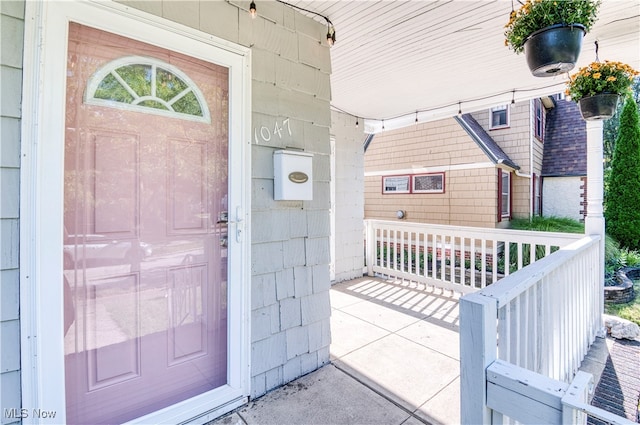 entrance to property with covered porch