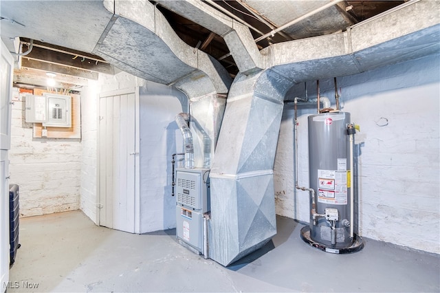 utility room featuring heating unit and water heater