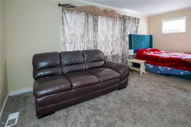 carpeted bedroom with crown molding