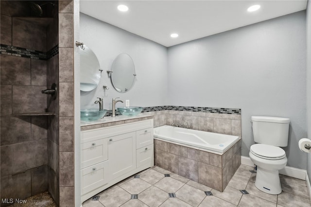 full bathroom with vanity, toilet, separate shower and tub, and tile patterned flooring