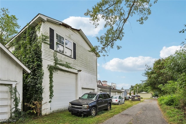 exterior space with a garage