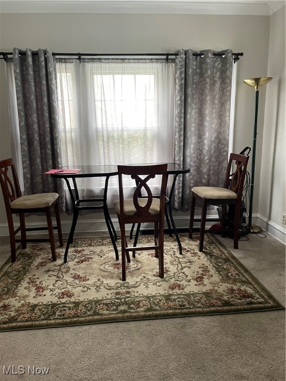 dining area with carpet flooring