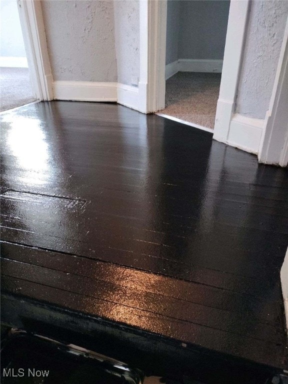 interior details with hardwood / wood-style flooring