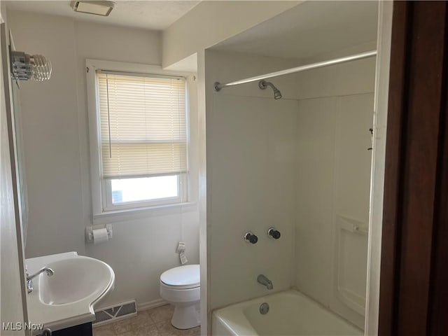 full bath with visible vents, tub / shower combination, toilet, tile patterned floors, and vanity