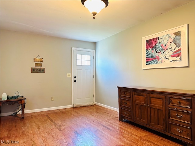 entrance foyer featuring light wood-type flooring