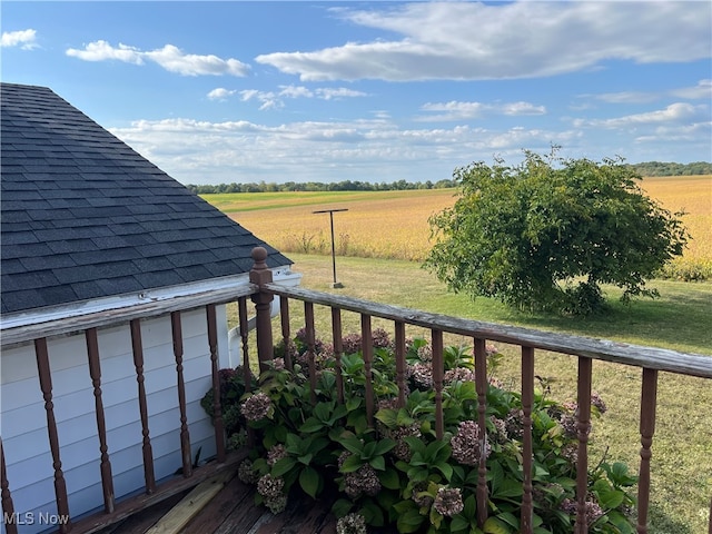 balcony featuring a rural view