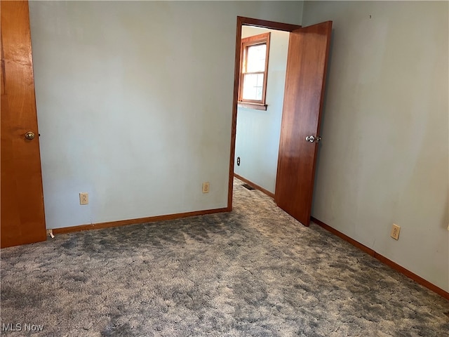 view of carpeted spare room