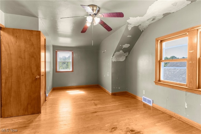 bonus room featuring ceiling fan and light hardwood / wood-style flooring