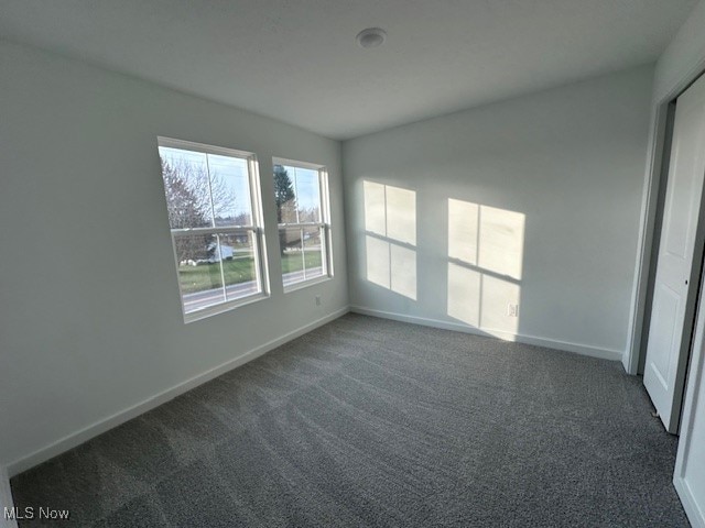 view of carpeted spare room