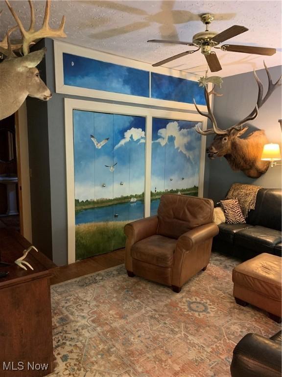 28815 State Route 7 N, Marietta, OH 45750 - living area with a textured ceiling and ceiling fan