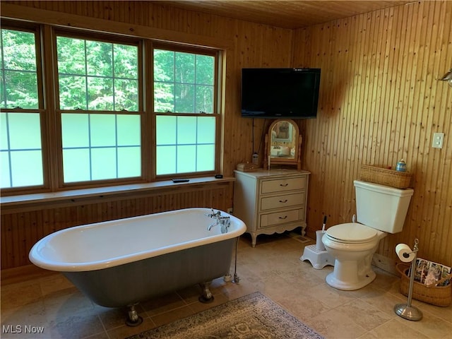 28815 State Route 7 N, Marietta, OH 45750 - bathroom with toilet, wood walls, and a soaking tub