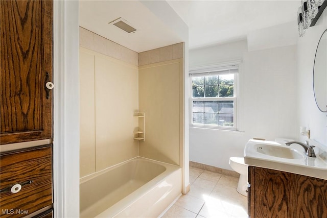 full bathroom featuring toilet, visible vents, baseboards, vanity, and tile patterned floors