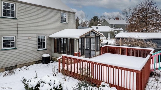 view of snow covered deck