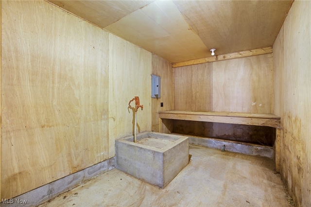 misc room with concrete floors