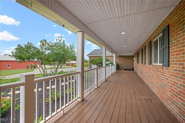 wooden deck featuring covered porch