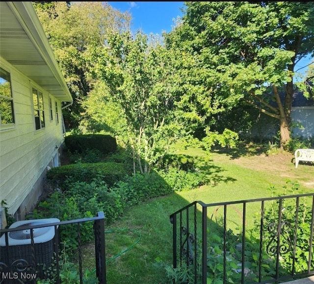 view of yard featuring central AC