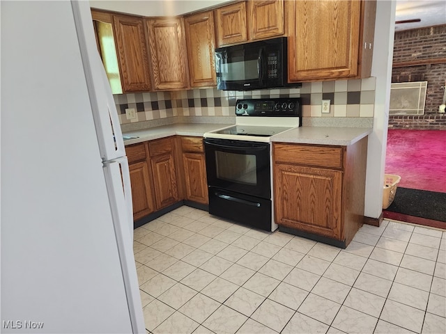 kitchen featuring white appliances, light tile patterned floors, backsplash, and brick wall