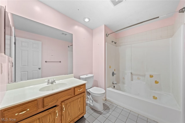 full bathroom with tile patterned floors, vanity, toilet, and  shower combination