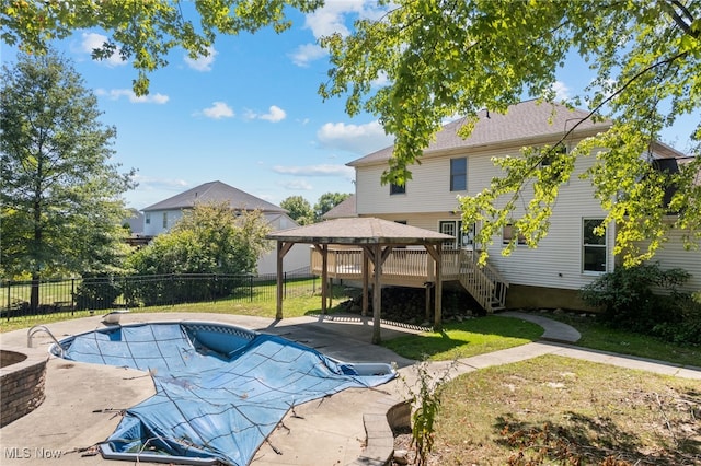 view of pool featuring a yard, a patio, and a gazebo