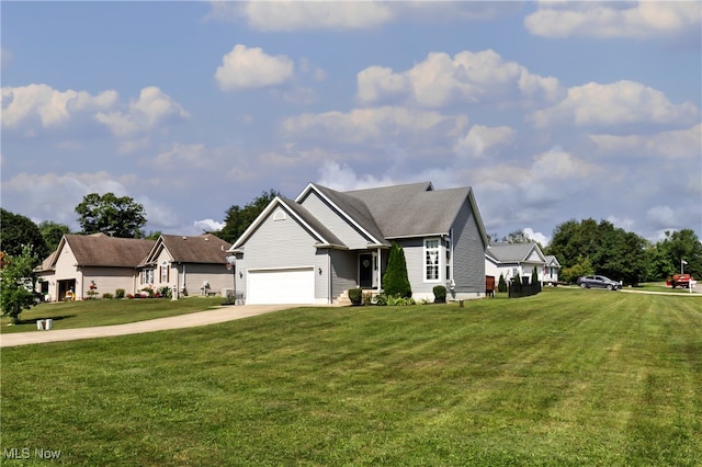 view of front of home with a garage and a front lawn