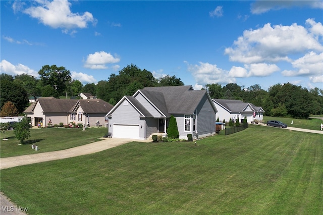 view of front of property featuring a garage and a front yard