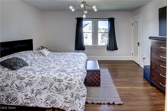 bedroom featuring dark wood-type flooring