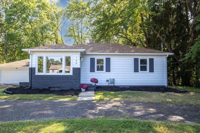 single story home featuring a garage