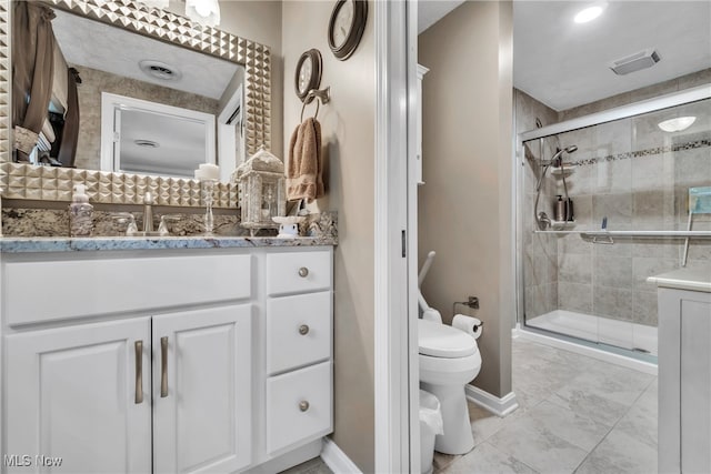 bathroom featuring an enclosed shower, toilet, and vanity